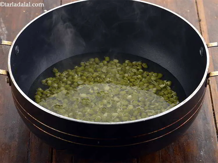 Step 4 – Boil 1 cup of water in a deep non-stick pan. Add the soaked, sprouted <em>moong</em> …
