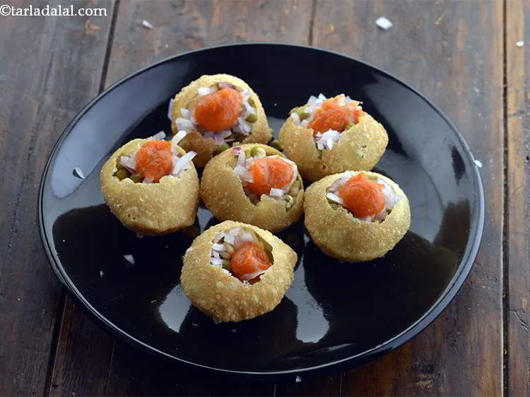 Step 14 – Now top each puri with approximately 1/8 tsp of the garlic chutney. Since this garlic …