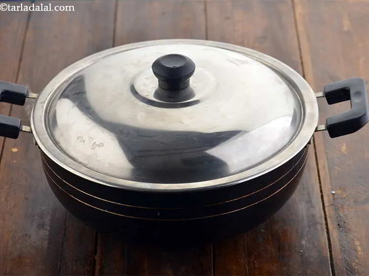 Step 5 – Cover with a lid. We are retaining the health aspect of the <em>moong</em> by two …