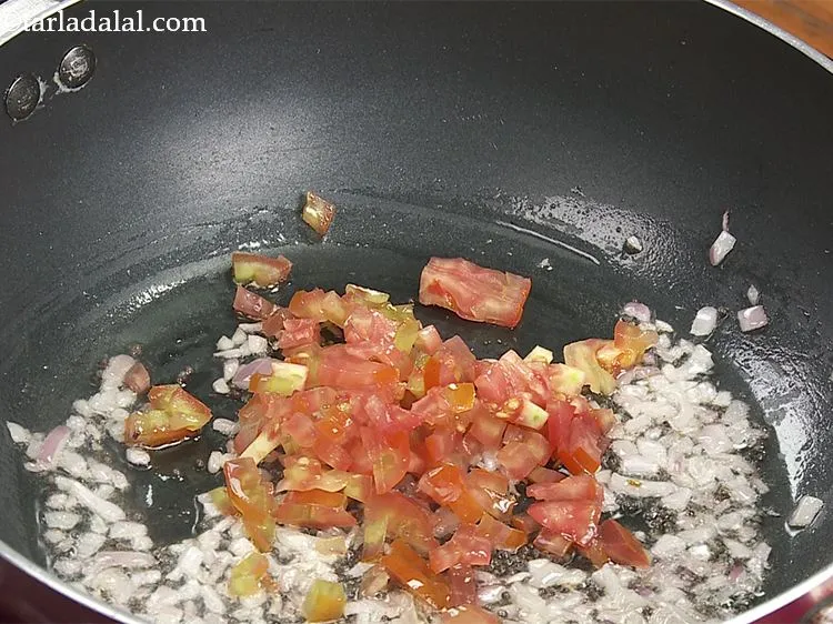 Step 15 – Add the tomatoes.