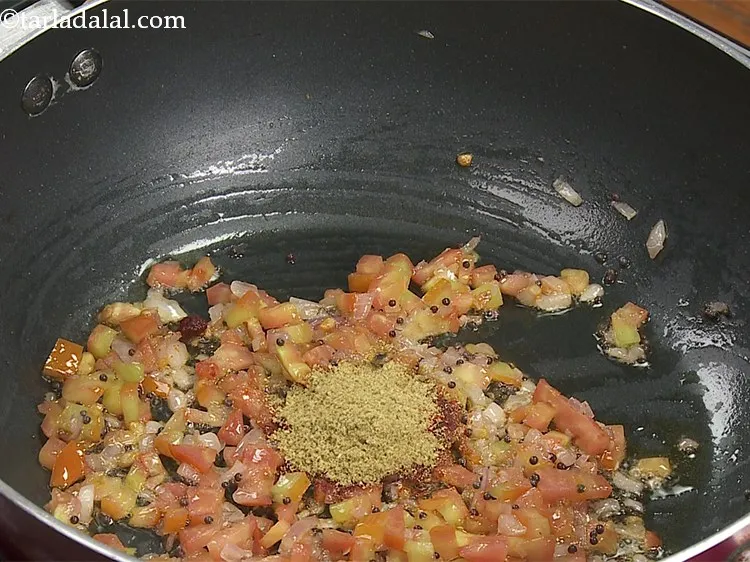 Step 18 – Add the coriander powder.