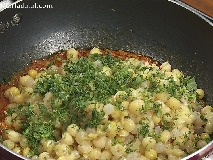 Step 23 – Add coriander.