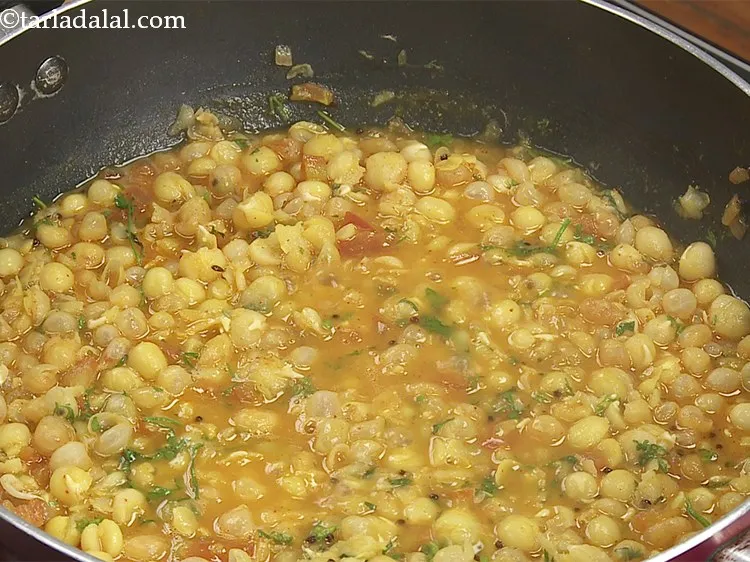 Step 25 – Cook on a medium flame for 2 to 3 minutes, while stirring occasionally. Our ragda …