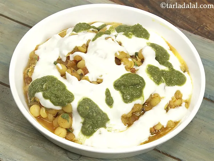 Step 30 – Pour &frac12; tbsp of green chutney. You can make the <a href="https://www.tarladalal.com/Green-Chutney-How-To-Make-Green-Chutney-Recipe-22266r" target="_blank">green chutney</a>&nbsp;a day …