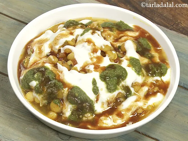 Step 31 – Drizzle 1 tbsp of <a href="https://www.tarladalal.com/Sweet-Chutney-Quick-Sweet-Chutney-395r" target="_blank">sweet chutney</a>. Also, the meethi chutney&nbsp;can be made prior …