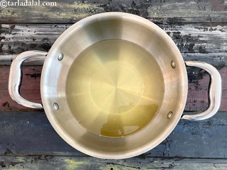 Step 16 – Heat the oil in a deep non-stick pan.