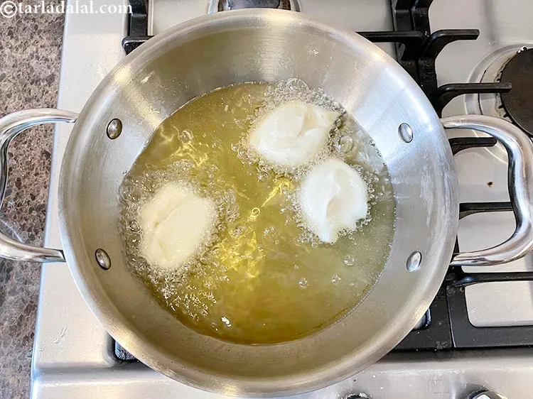 Step 19 – Drop the batter into the pan.&nbsp;Deep-fry 3 or 6&nbsp;vadas at a time, depending on the …