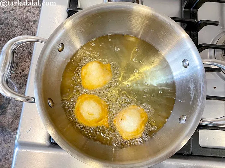 Step 22 – Deep fry until they turn light golden brown. You will need to keep flipping the …