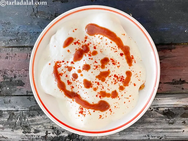 Step 35 – Spread 2&nbsp;tbsp&nbsp;<a href="khajur-imli-ki-chutney-22265r">khajur imli ki chutney</a>. For 2 separate plates, spread 1 tbsp chutney in …