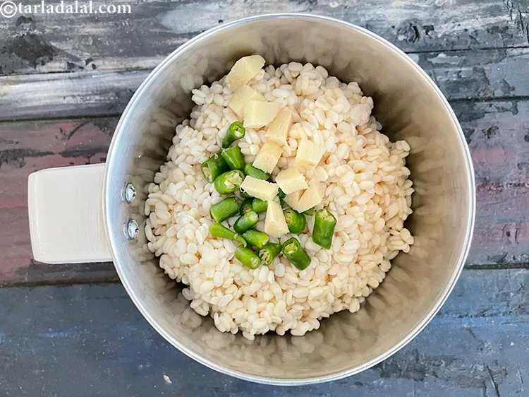 Step 10 – Add&nbsp;<meta charset="UTF-8" />2 tsp&nbsp;roughly&nbsp;<a href="glossary-chopped-ginger-786i">chopped ginger (adrak)</a>.