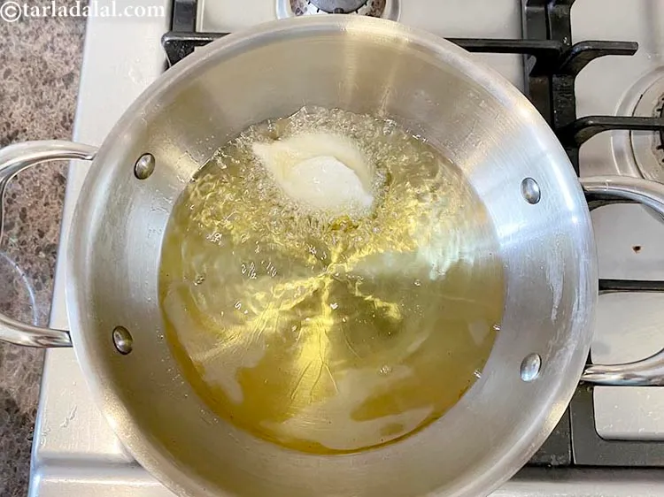 Step 44 – Put a small portion of the batter into the hot oil and see if the …