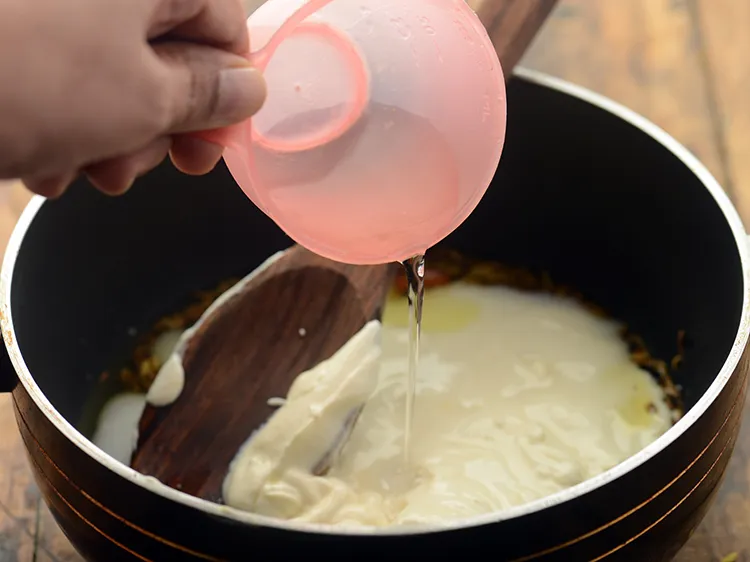 Step 18 – Add &frac14; cup of water. Add more or less water as per the consistency you …