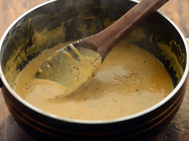 Step 22 – Mix well and cook on a low flame for 2 minutes, while stirring continuously. It …