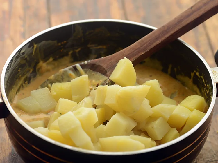 Step 23 – Add potatoes. If you have boiled potatoes handy in the refrigerator then this dahi aloo …