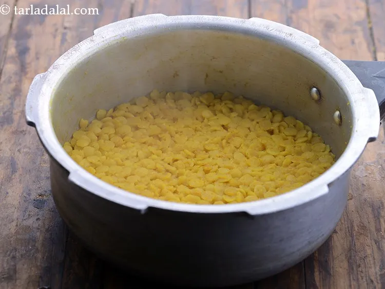 Step 9 – Mix well and pressure cook for 2 whistles. Allow the steam to escape before opening …