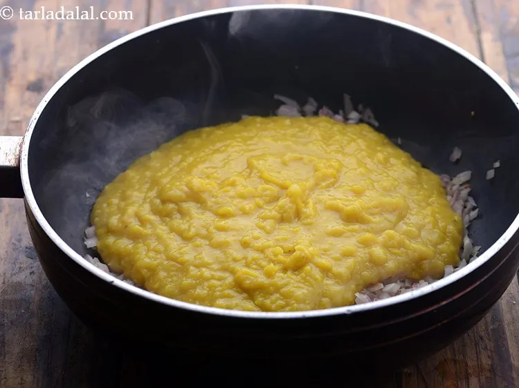 Step 18 – Add the cooked dal.