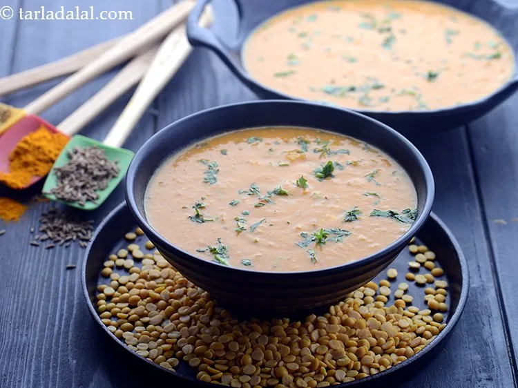 Step 28 – Serve <strong>Dahiwali Toor Dal</strong> immediately. If serving later then add some more water and adjust …