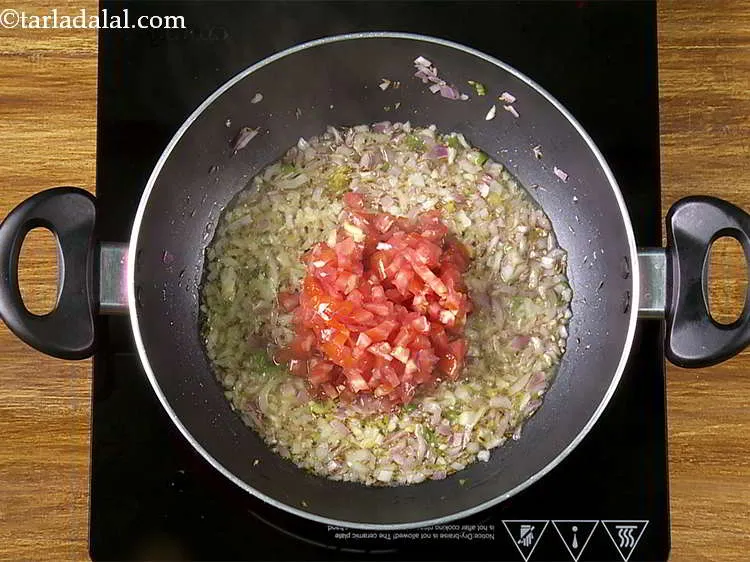 Step 17 – Add the tomatoes.