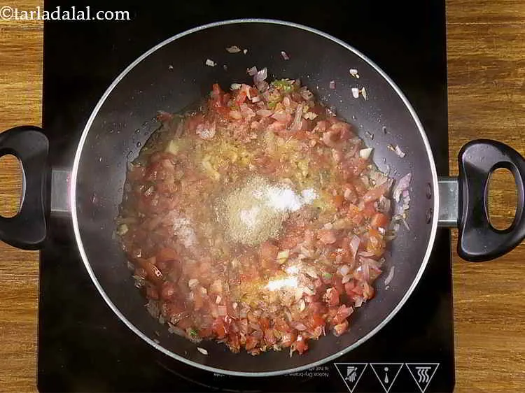 Step 20 – Add the coriander powder and salt. We even added salt while cooking the dals so …