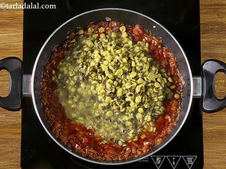 Step 22 – Add the cooked dal.