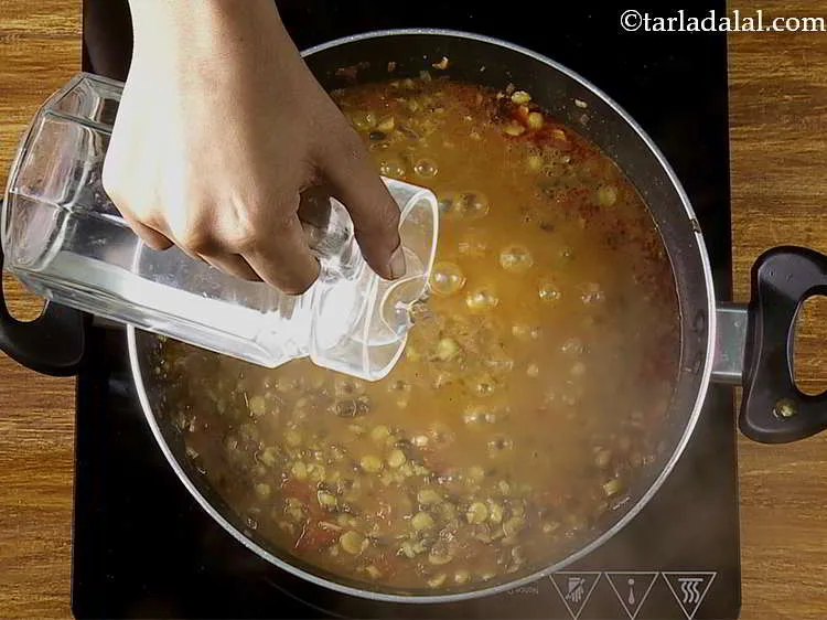 Step 23 – Add about &frac14; cup of water. The <strong>langarwali dal</strong>,&nbsp;<strong>Dal Amritsari (Punjabi Amritsari dal)</strong>&nbsp;is generally thick …