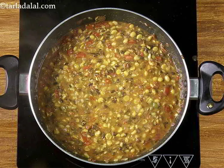 Step 24 – Mix the&nbsp;<strong>Dal Amritsari (Punjabi Amritsari dal)</strong>&nbsp;well and cook on a medium flame for 2 minutes, …