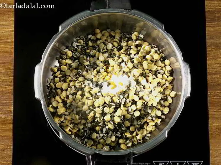 Step 7 – Also, add turmeric powder, salt.