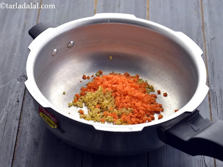 Step 22 – Add finely chopped carrot to it.&nbsp;