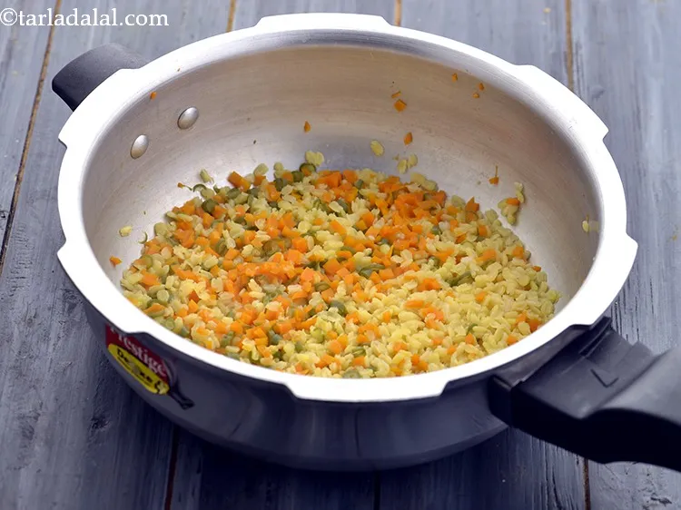 Step 27 – Open the lid. This is how cooked mixture for <strong>Mashed Vegetable Dal for Babies</strong> will …
