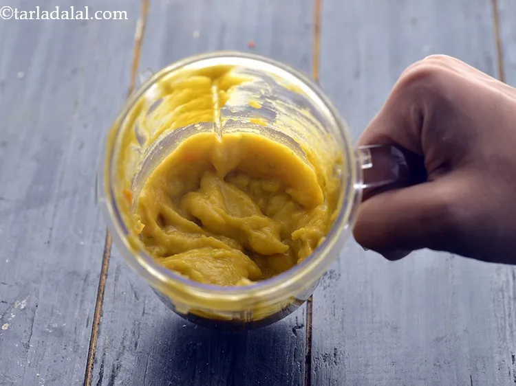 Step 28 – Transfer the mixture into a mixer jar and blend till it is smooth. Do not …