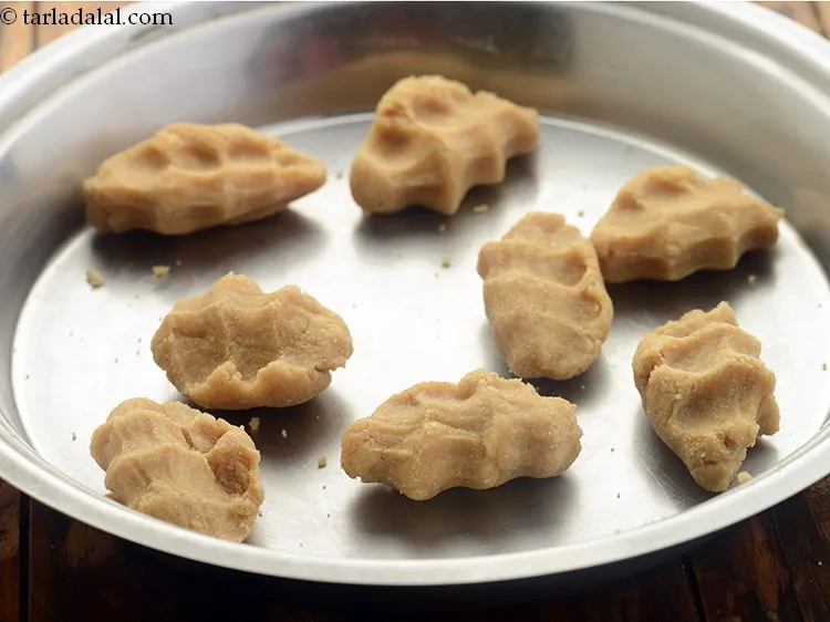 Step 8 – Shape each portion into the shape of your fist. The dough portion should be firm …