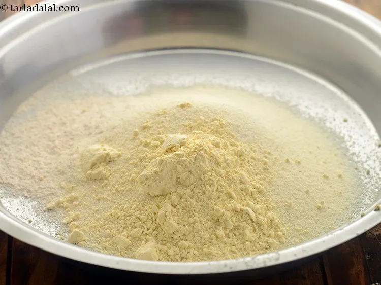 स्टेप 55 – बेसन डालें।