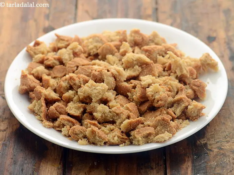 Step 14 – <div> Once cooled, break the fried dough portions into small pieces with your hands.</div> &nbsp;