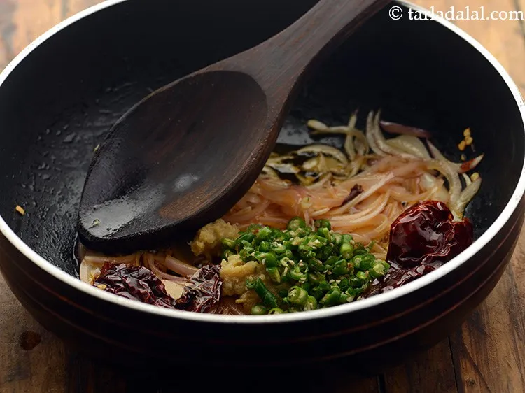 Step 15 – Add green chillies. Adjust the quantity as per the spice level you can handle.