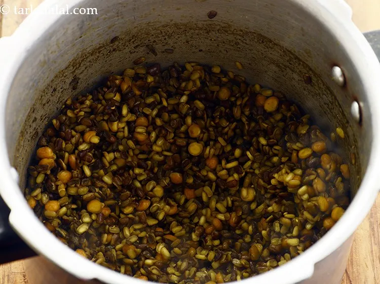 Step 7 – Pressure cook for 4 whistles or until the dal is cooked. Allow the steam to …