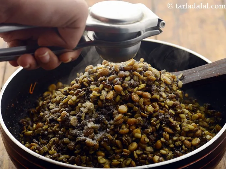 Step 20 – Add lemon juice to give a tangy flavor to <strong>Rajasthani dal banjari</strong>.