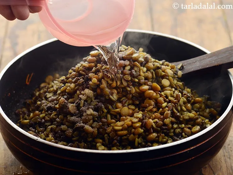 Step 21 – Add 2 cups of water and mix well. Add more or less water as per …