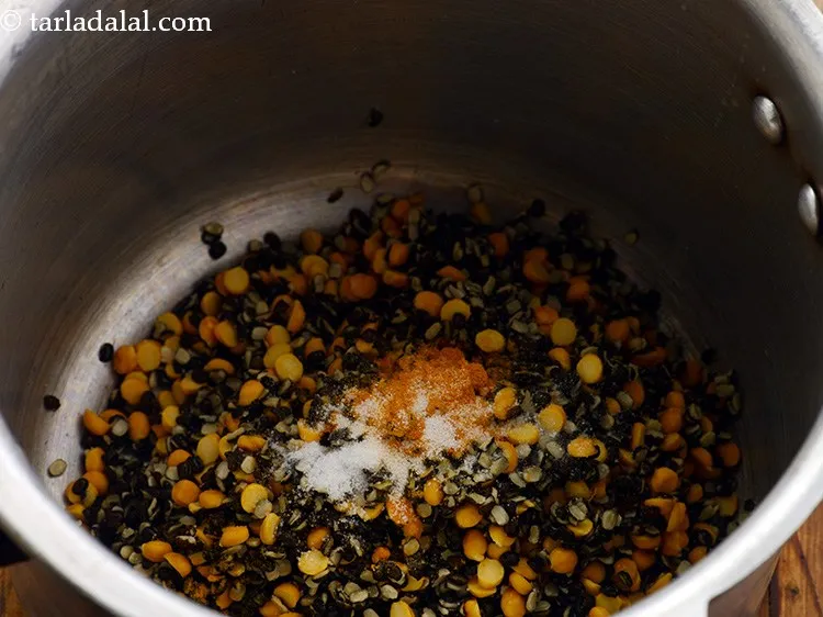 Step 5 – Add turmeric powder and salt.