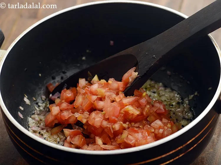 Step 19 – Add the tomatoes.