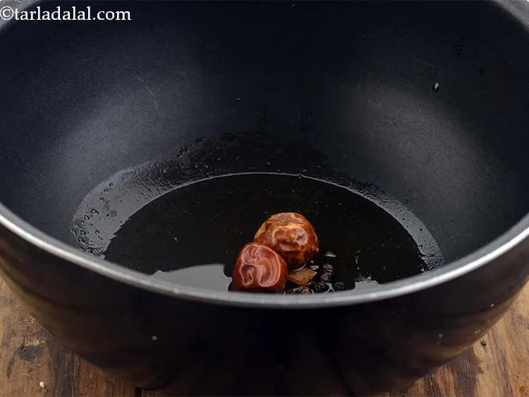 Step 17 – Now add the red chillies for color and spice.