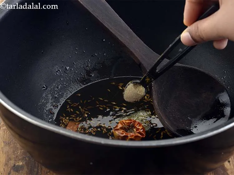 Step 20 – Add the remaining &frac14; tsp of asafoetida to the ghee.