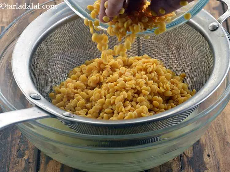 Step 4 – Drain the dal using a strainer.