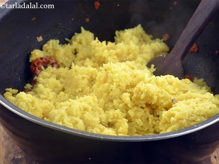 Step 30 – Add the cooked rice-dal mixture to this.