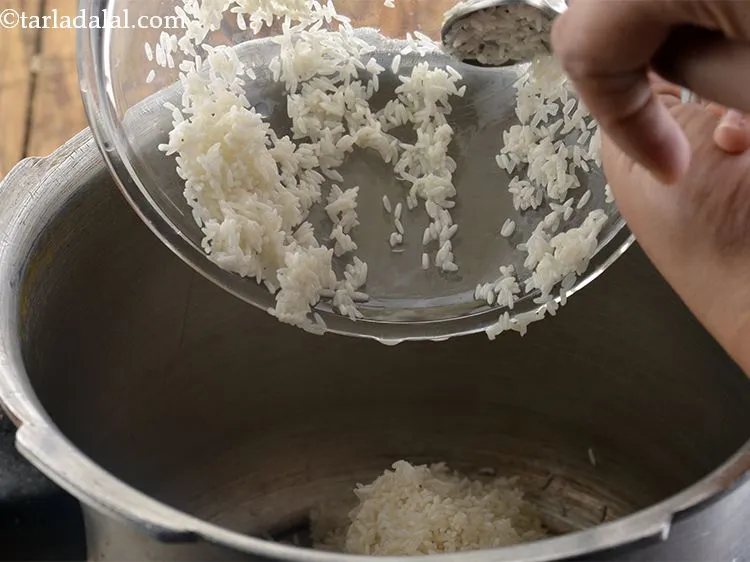 Step 7 – Add the rice as well. <strong>Dal khichdi </strong>is essentially a dish made by cooking dal …