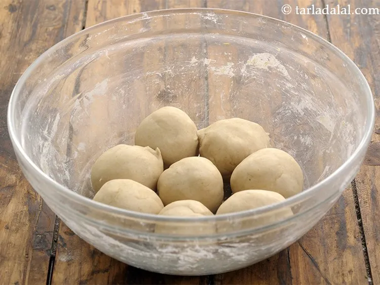 Step 20 – To roll&nbsp;<strong>dal paratha | yellow moong dal paratha | healthy dal paratha |&nbsp;</strong>&nbsp;divide the dough …