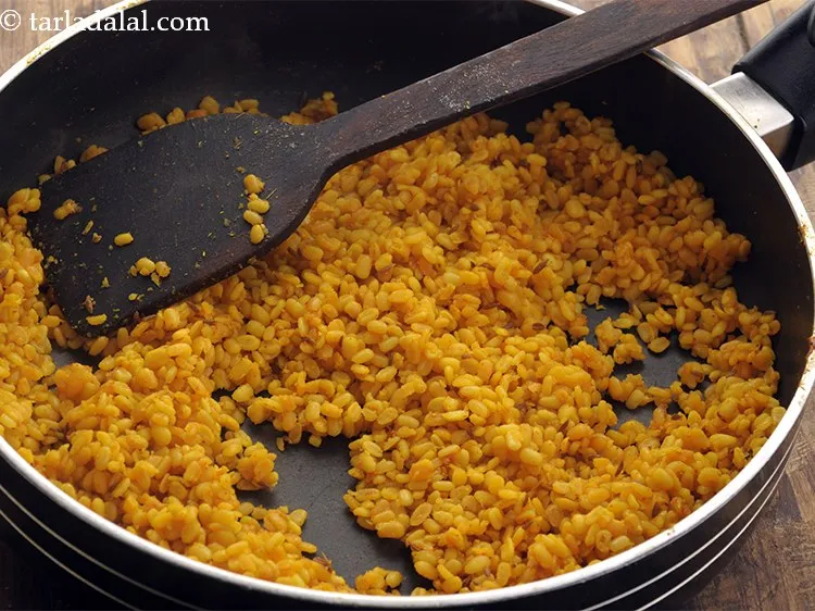 Step 18 – Add approx. &frac12; cup of water and mix well. Cover and cook on medium flame …