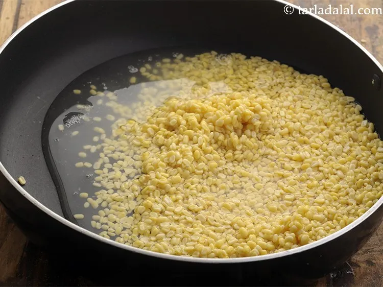 Step 8 – Combine the yellow moong dal with 1 cup of water in a broad non stick …
