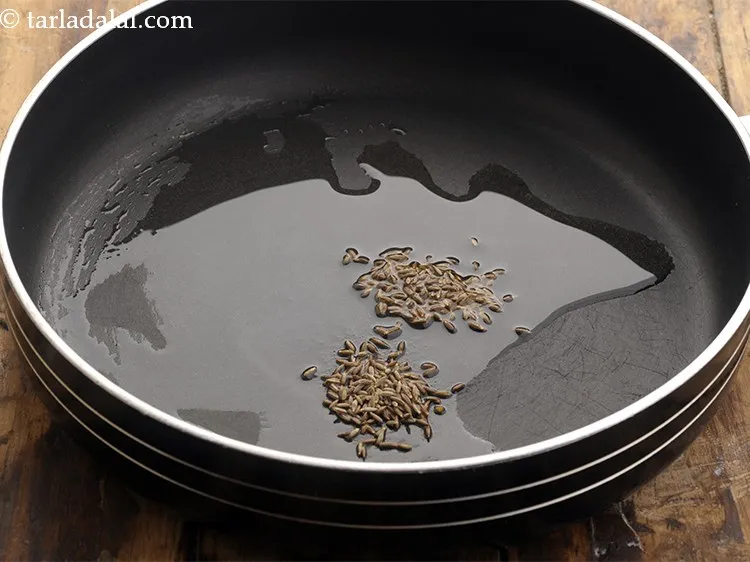 Step 11 – Add cumin seeds. Let them crackle.