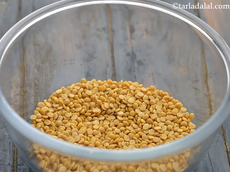 Step 7 – To prepare <strong>Dal tadka</strong>, place toovar dal in a bowl.&nbsp;