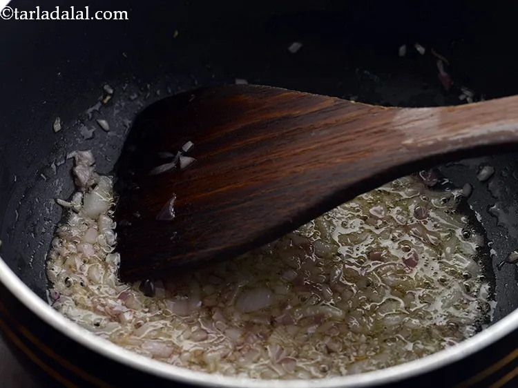 Step 24 – Saut&eacute; the onions on a medium flame for 1-2 minutes.